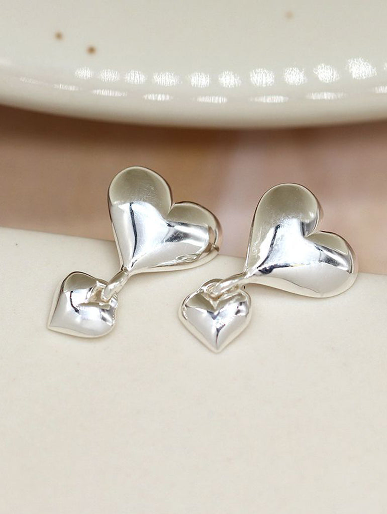 Double Drop Silver Heart Studs – stylish accessories from C&K, an independent lifestyle store in Settle, North Yorkshire.